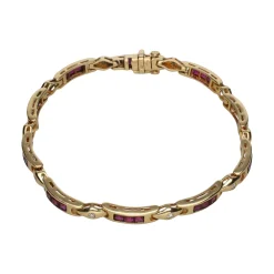 PULSERAS Pulsera en oro amarillo con rubíes y brillantes.