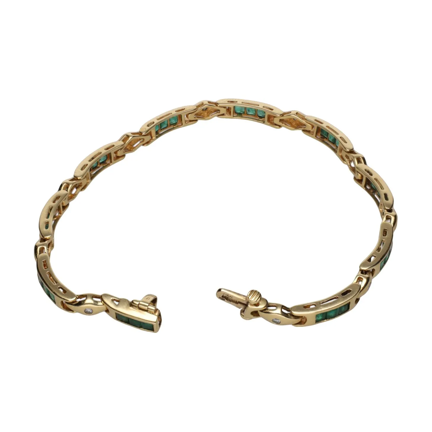 PULSERAS Pulsera en oro amarillo con esmeraldas y brillantes.