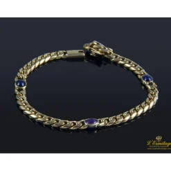 PULSERAS Pulsera en oro amarillo con rubí y zafiros