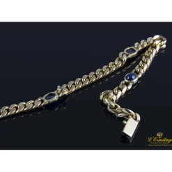 PULSERAS Pulsera en oro amarillo con rubí y zafiros
