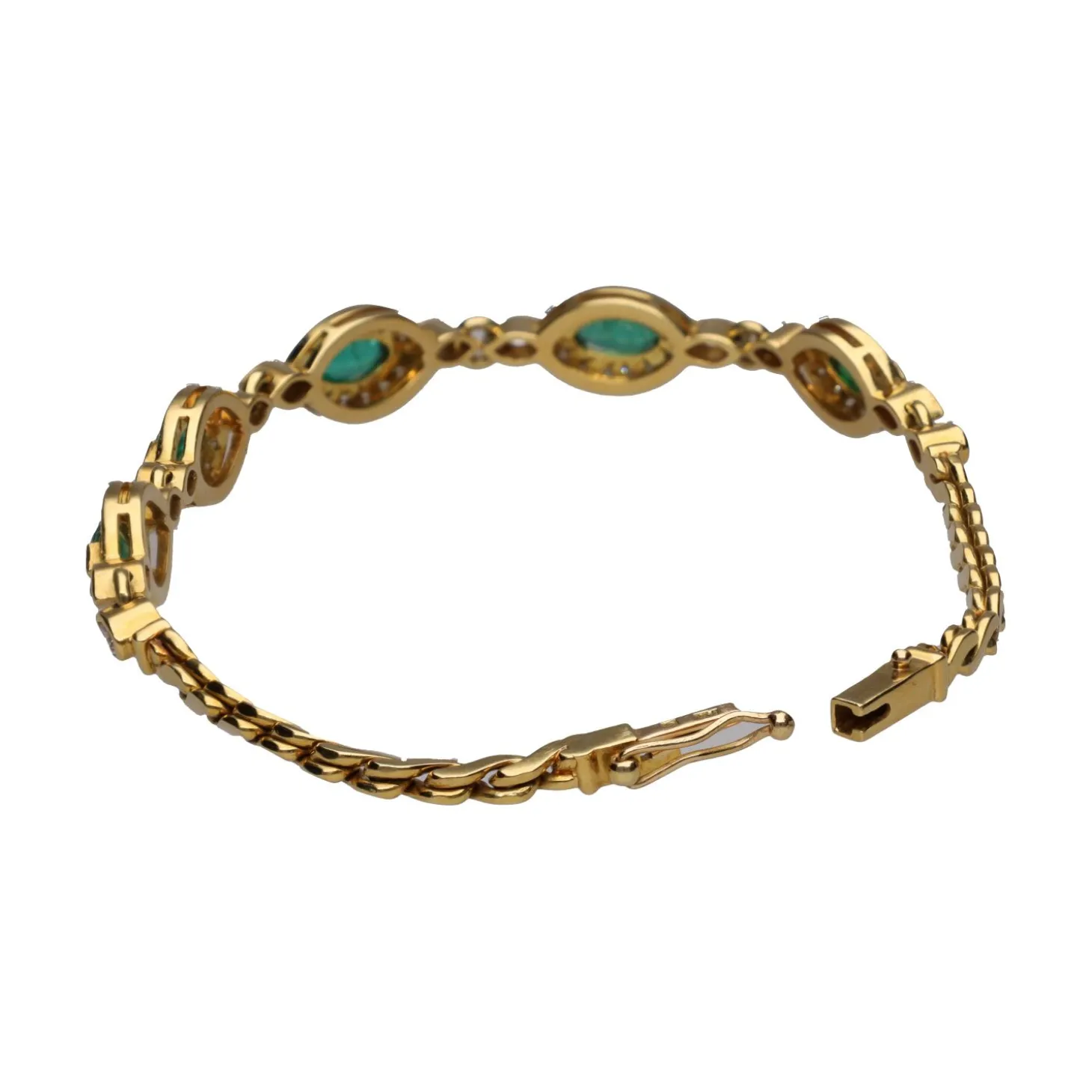 PULSERAS Pulsera en oro amarillo con esmeraldas y brillantes.