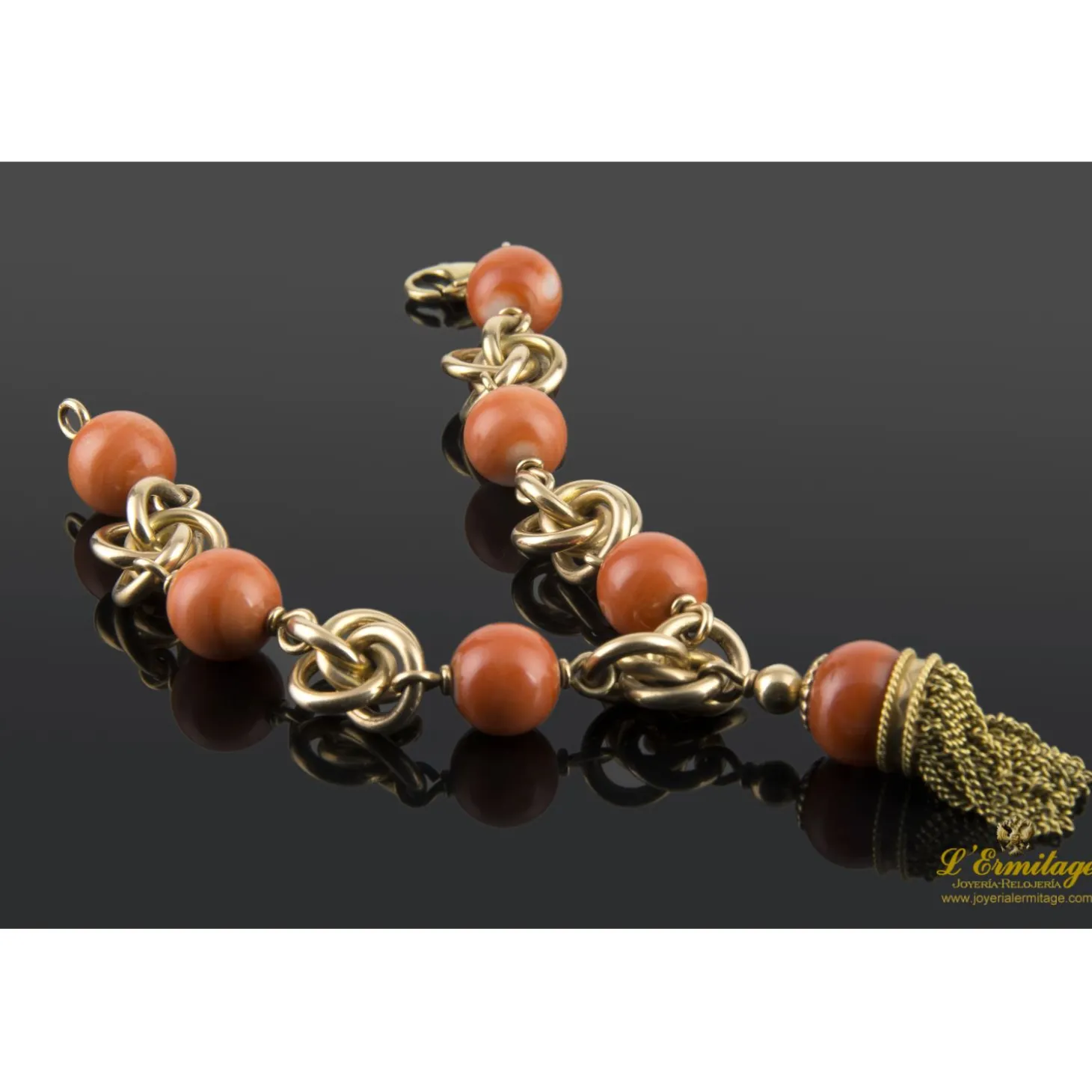 PULSERAS Pulsera en oro amarillo con bolas de coral