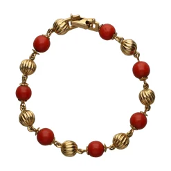 PULSERAS Pulsera en oro amarillo y coral.