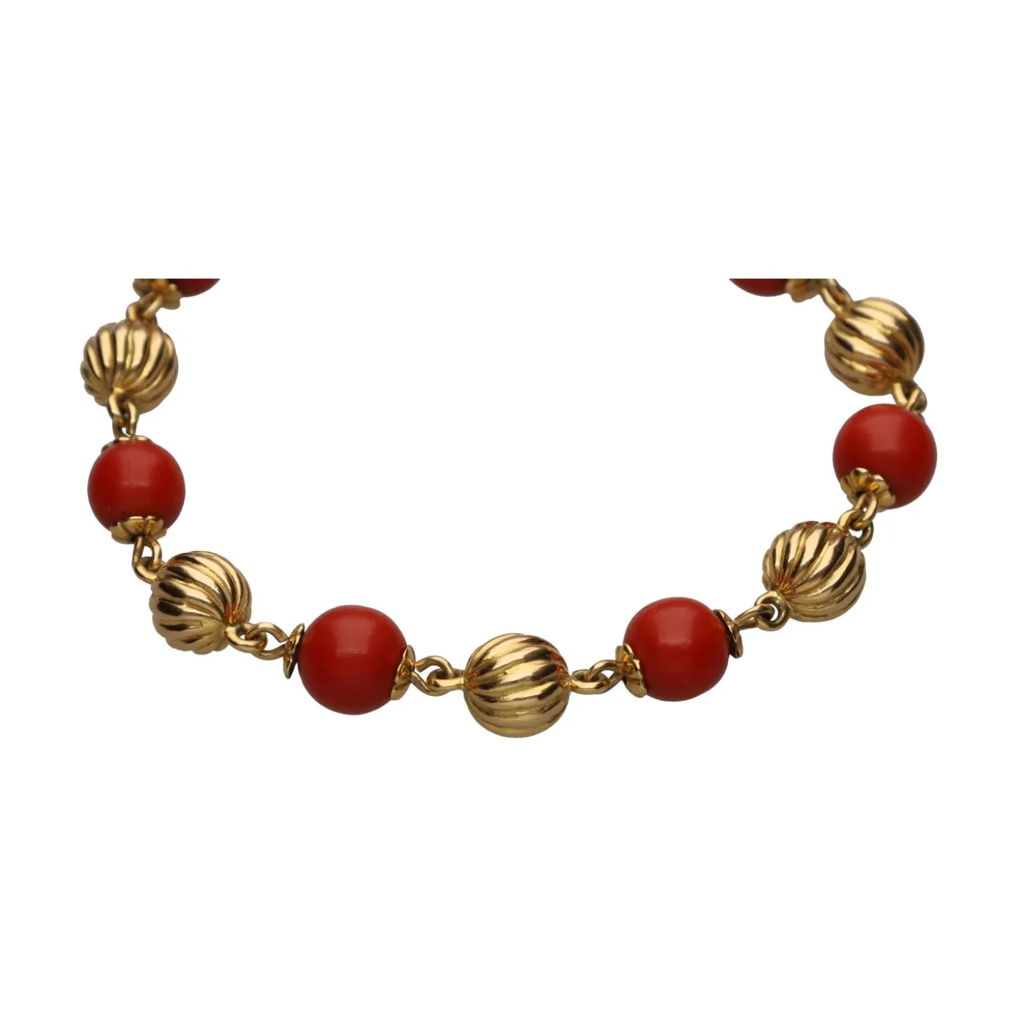PULSERAS Pulsera en oro amarillo y coral.