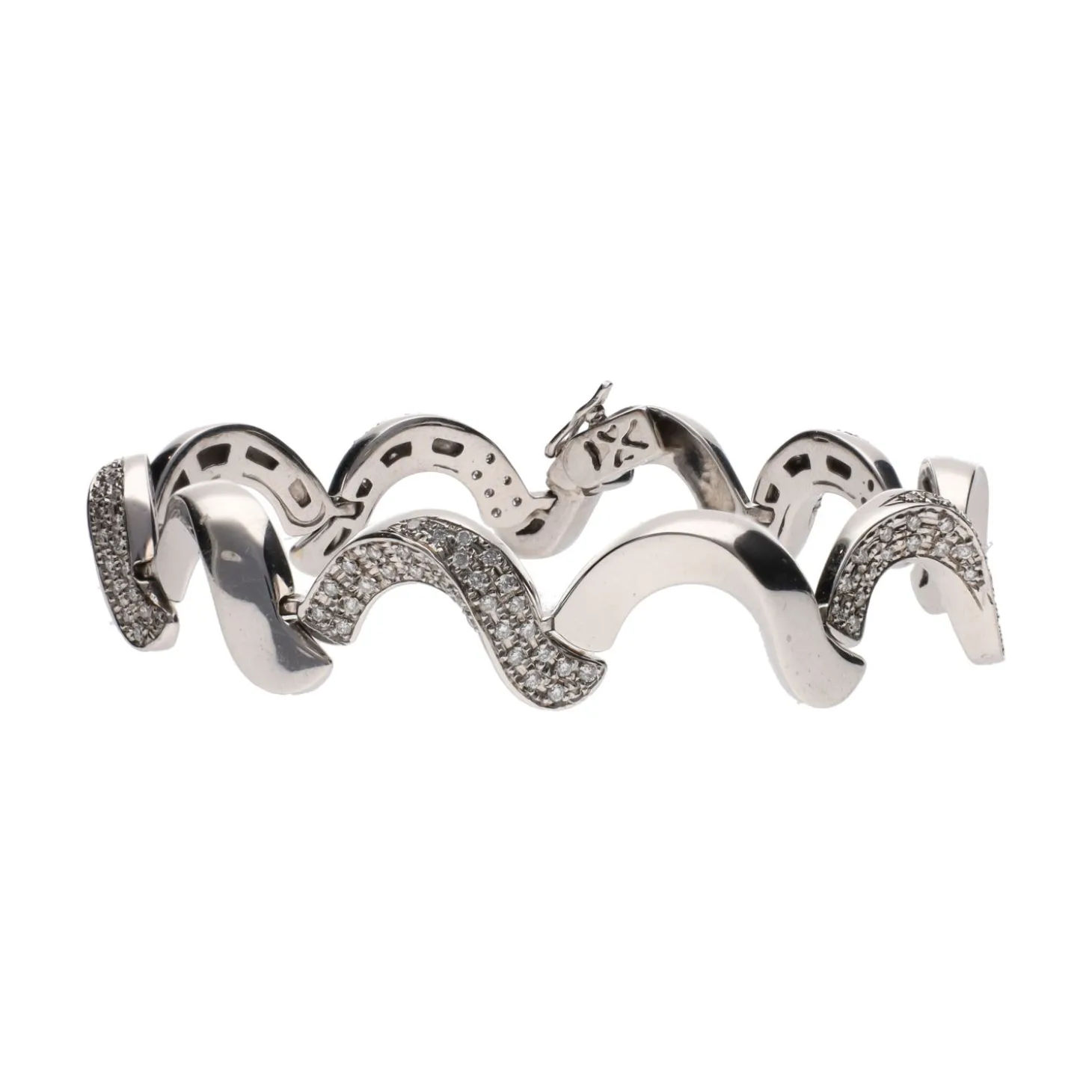 PULSERAS Pulsera en oro blanco con brillantes.