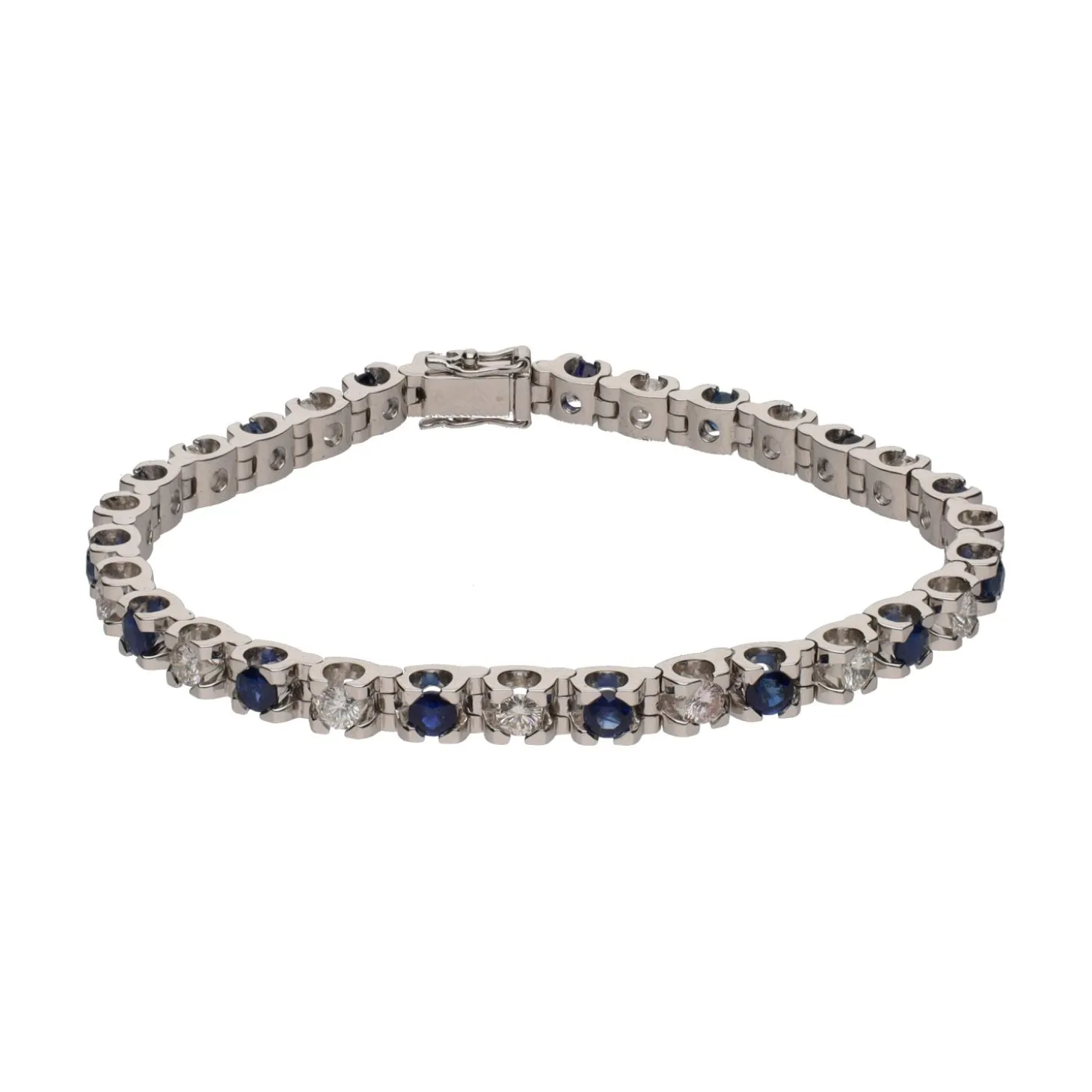 PULSERAS Pulsera en oro blanco con zafiros y brillantes.