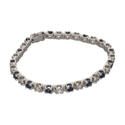 PULSERAS Pulsera en oro blanco con zafiros y brillantes.
