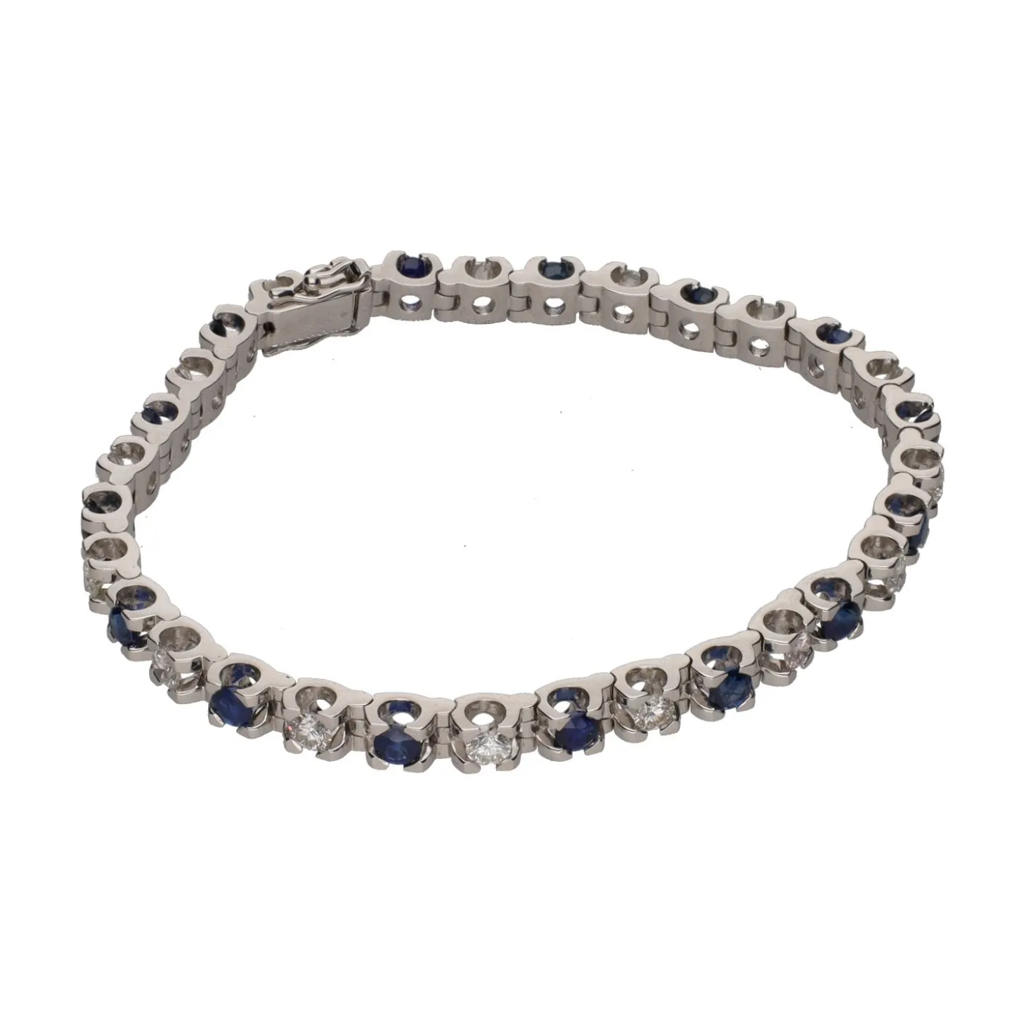 PULSERAS Pulsera en oro blanco con zafiros y brillantes.