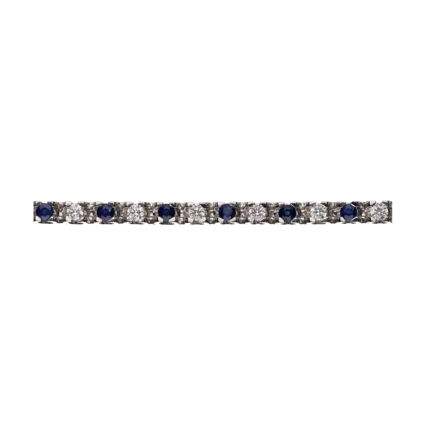 PULSERAS Pulsera en oro blanco con zafiros y brillantes.
