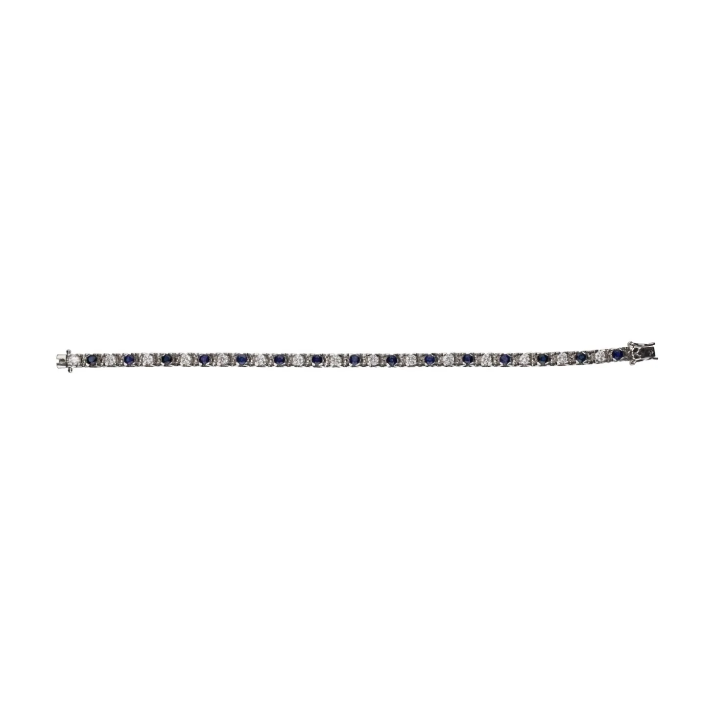 PULSERAS Pulsera en oro blanco con zafiros y brillantes.