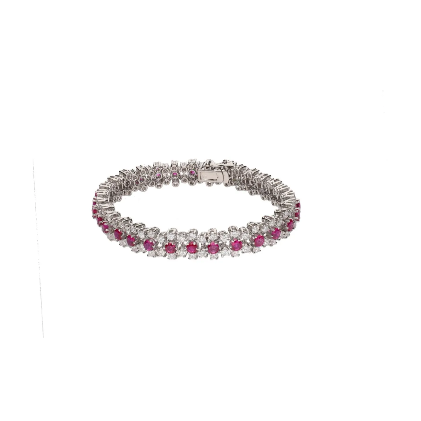 PULSERAS Pulsera en oro blanco con rubíes y brillantes.
