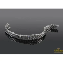 PULSERAS Pulsera en oro blanco con doble fila de brillantes.