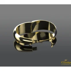 PULSERAS Pulsera oro amarillo media caña con malaquita.