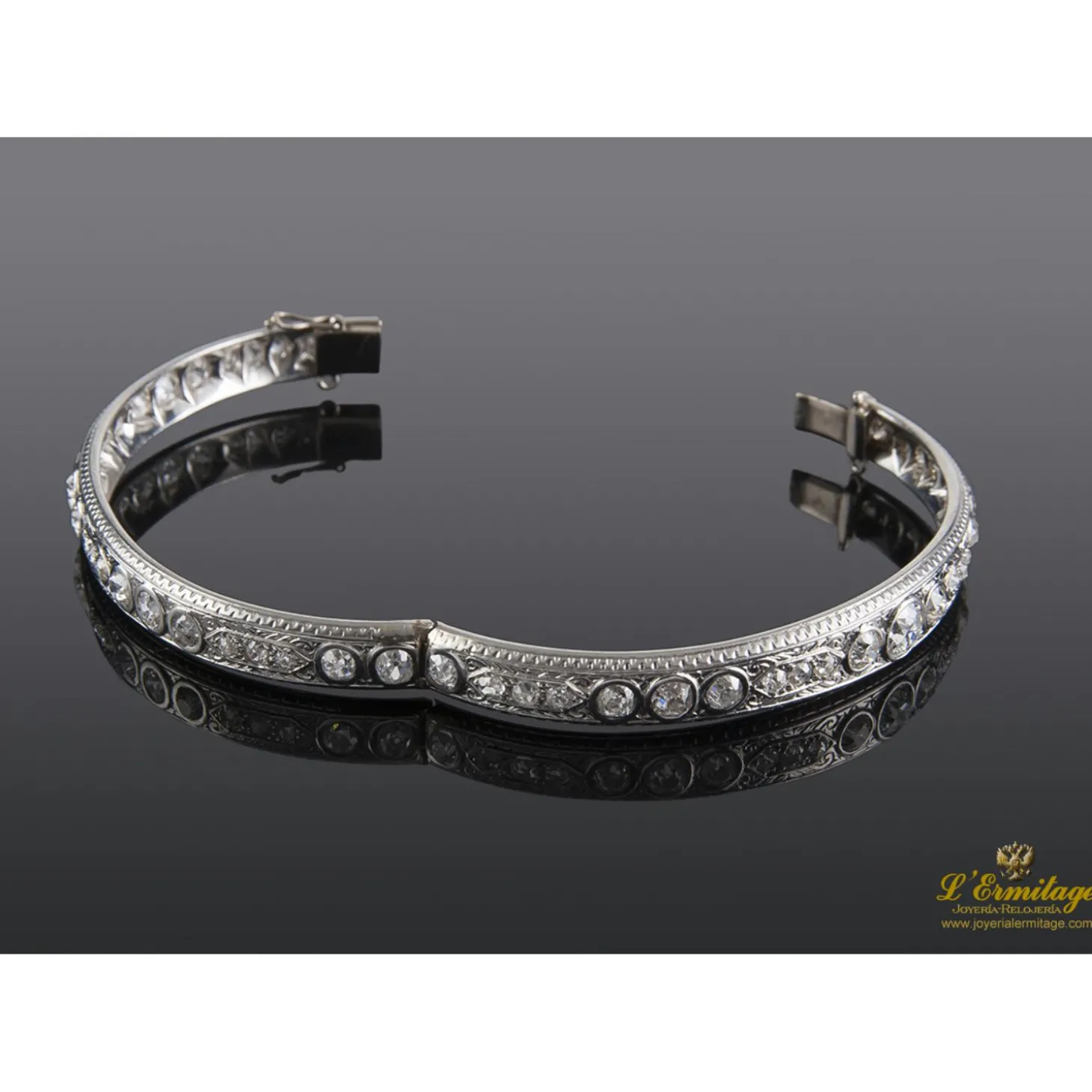 PULSERAS Pulsera platino de media caña y diamantes talla antigua