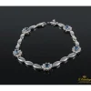 PULSERAS Pulsera realizada en oro blanco con rosetas de agua marina y brillantes.