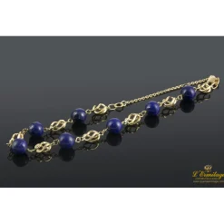 PULSERAS Pulsera realizada en oro amarillo con bolas de lapislázulis.