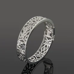 PULSERAS Pulsera rígida calada oro blanco y diamantes