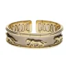PULSERAS Pulsera rígida en oro amarillo y oro blanco detalles panteras.