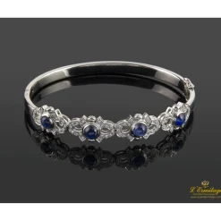 PULSERAS Pulsera rígida oro blanco zafiros cabuchón y diamantes
