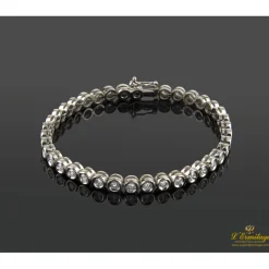 PULSERAS Pulsera riviere chatones oro blanco brillantes.