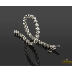 PULSERAS Pulsera riviere chatones oro blanco brillantes.