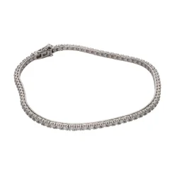 PULSERAS Pulsera riviere en oro blanco y brillantes.