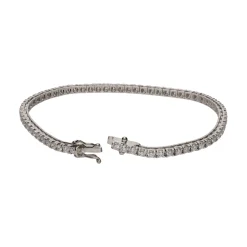 PULSERAS Pulsera riviere en oro blanco con brillantes.