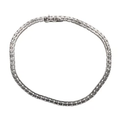 PULSERAS Pulsera riviere en oro blanco con brillantes.