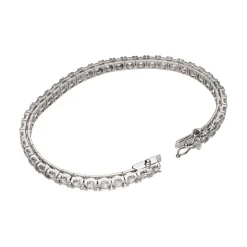 PULSERAS Pulsera riviere en oro blanco con brillantes.