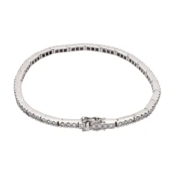 PULSERAS Pulsera riviere en oro blanco y brillantes.