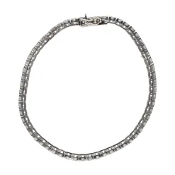 PULSERAS Pulsera riviere en oro blanco con brillantes.