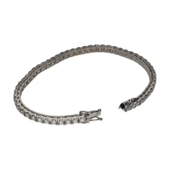 PULSERAS Pulsera riviere en oro blanco con brillantes.