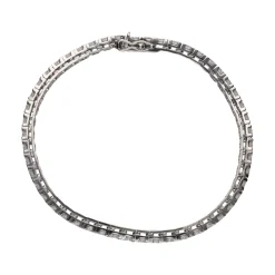PULSERAS Pulsera riviere en oro blanco con brillantes.