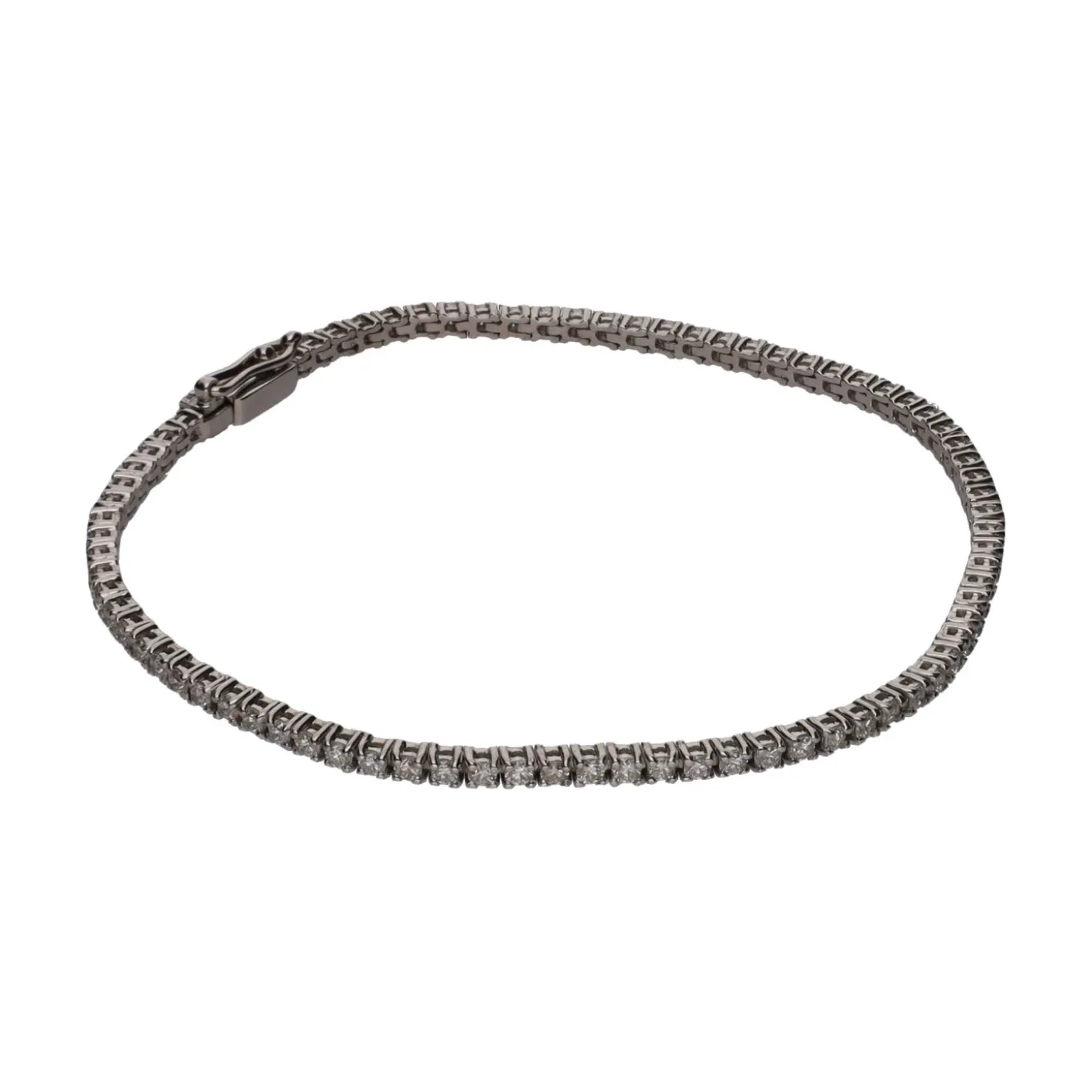 PULSERAS Pulsera riviere en oro blanco con brillantes.