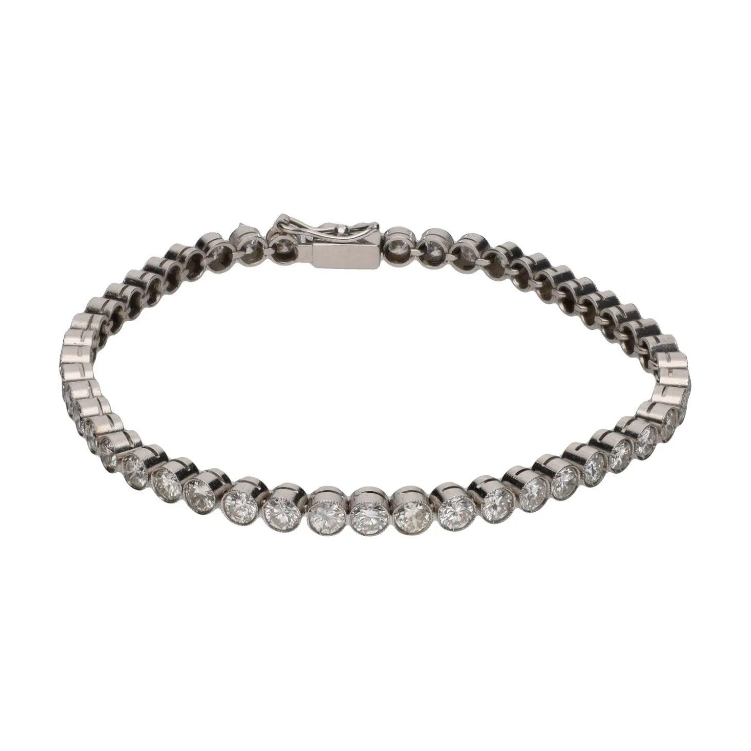PULSERAS Pulsera riviere en oro blanco con brillantes.