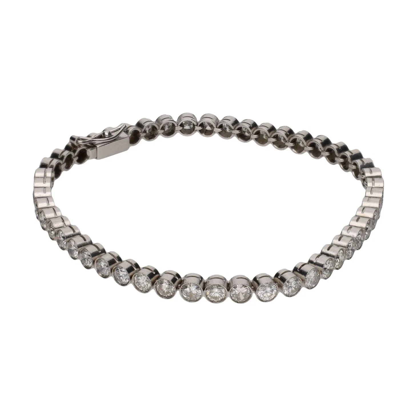 PULSERAS Pulsera riviere en oro blanco con brillantes.