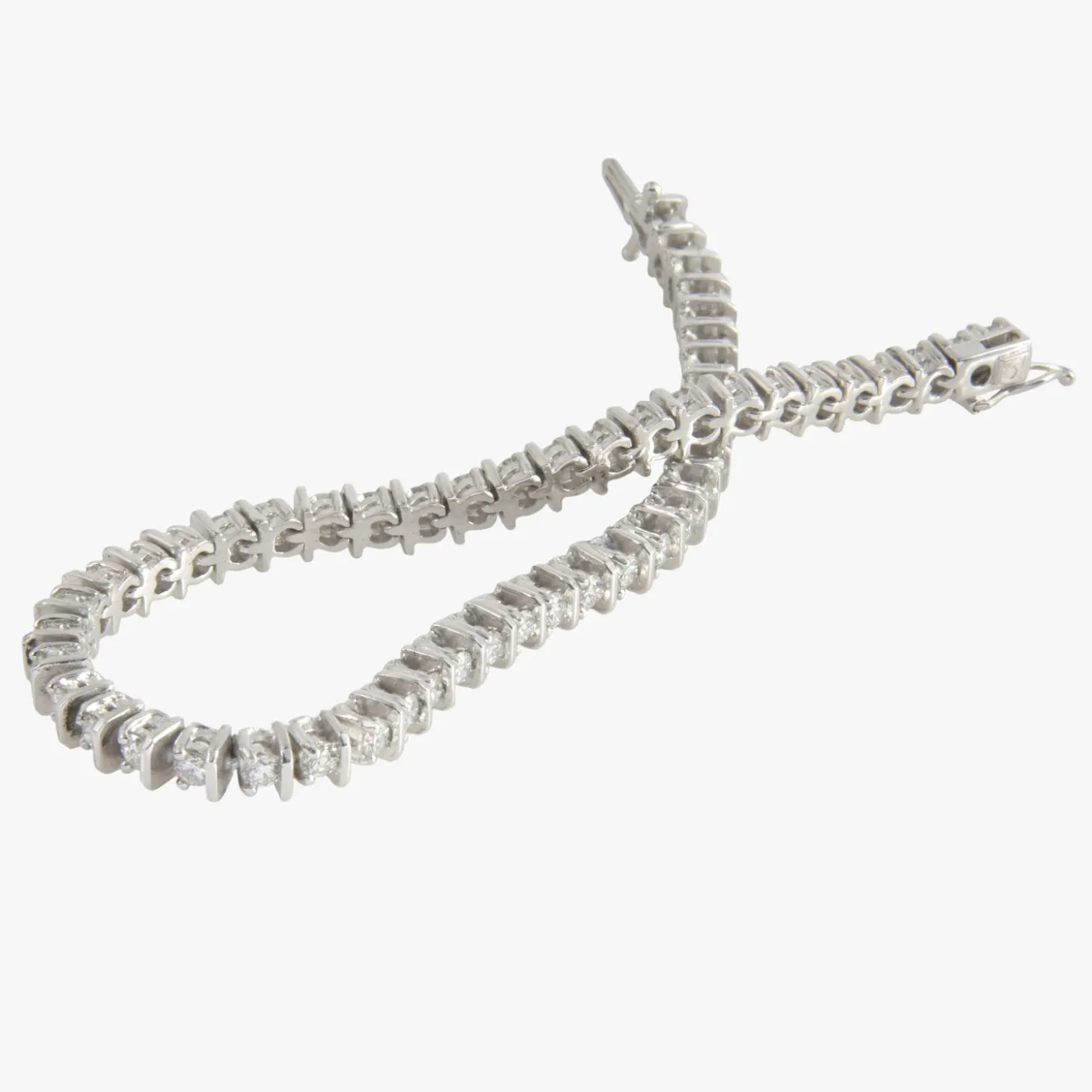 PULSERAS Pulsera riviere oro blanco y diamantes.