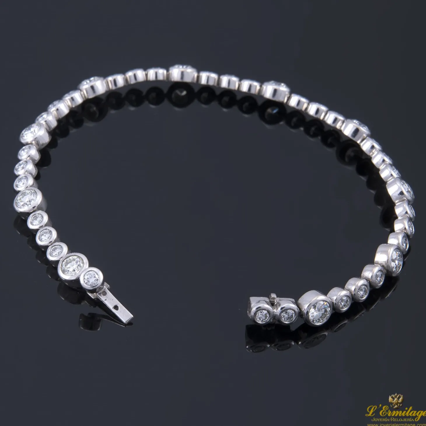 PULSERAS Pulsera riviere oro blanco y diamantes.