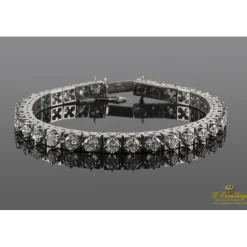 PULSERAS Pulsera riviere oro blanco y diamantes.