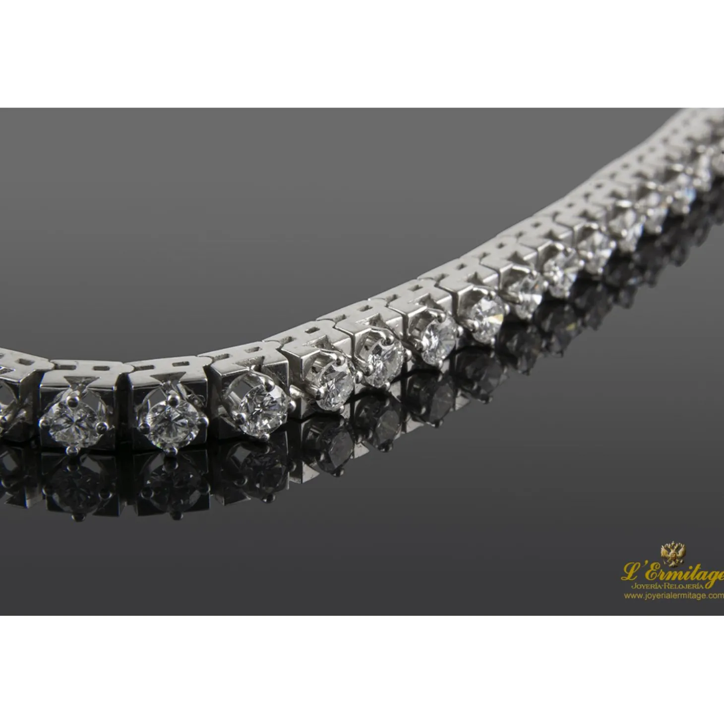 PULSERAS Pulsera riviere oro blanco y diamantes.