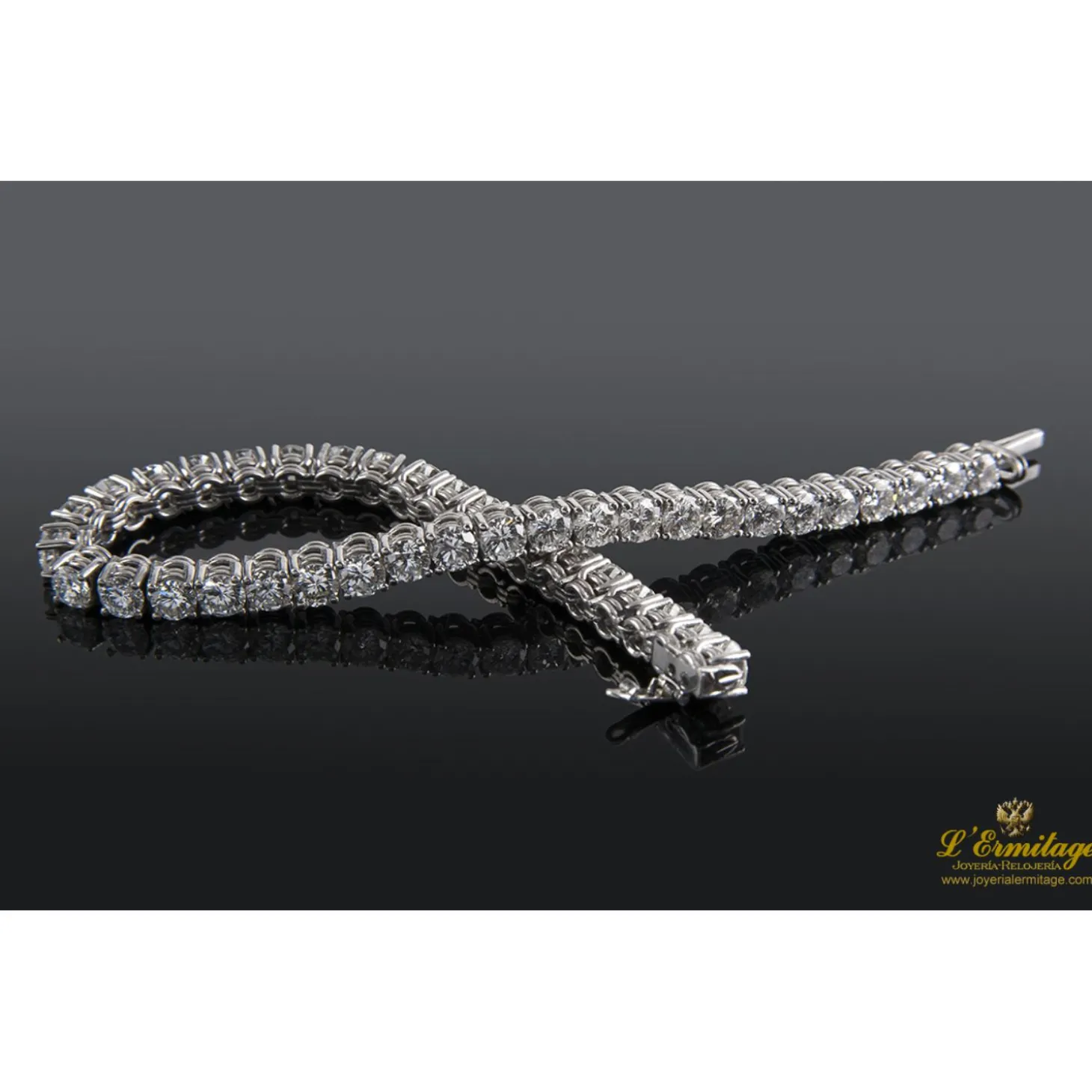 PULSERAS Pulsera riviere oro blanco y diamantes.