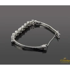 PULSERAS Pulsera semirrígida oro blanco y diamantes.